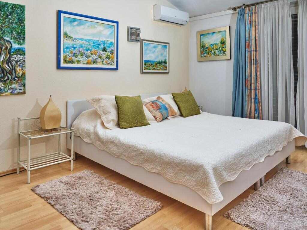 Double room with paintings